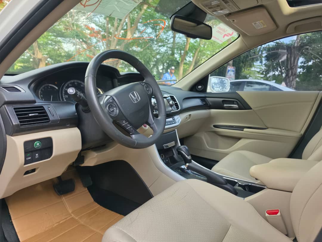 
								New in: Extremely clean First body foreign used 2014 Honda accord EXL double screen with sweet black interior, Keyless Sunroof going for just 14m 200k sambo full									