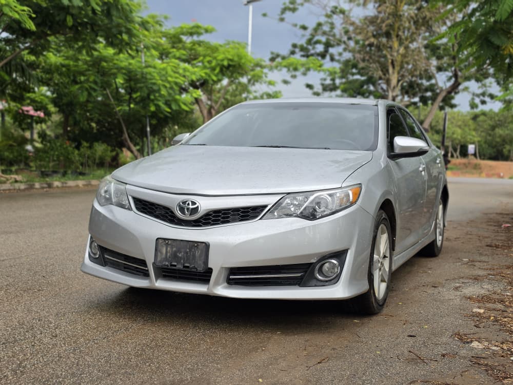 
								New in: Belgium Standard 2013 Toyota Camry SE with Nov 2025 Duty.  THIS TOYOTA CAMRY WAS BOUGHT FROM ME  AND REGISTERED NOVEMBER 2025,CAR IS STILL IN ITS BELGIUM STATE..WHY NOT PAY #11.5M 200k Sambo FOR THIS   Note: Not selling with number plates full									