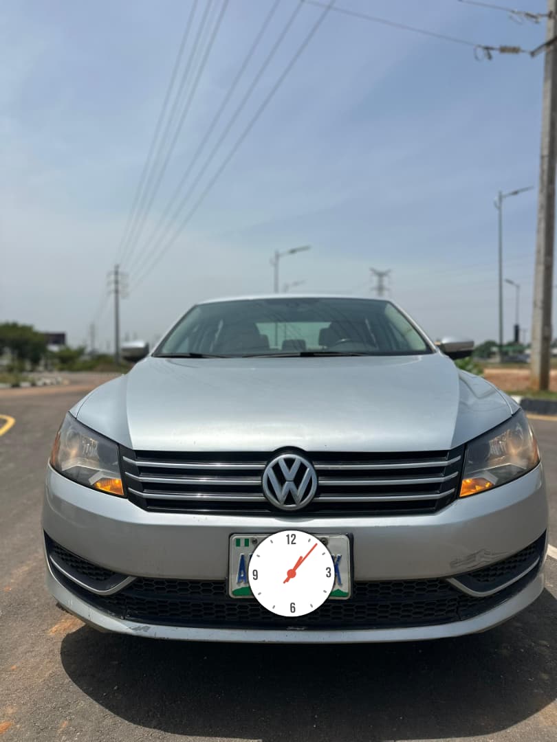 
								Good Deal‼️‼️‼️ Grade A (Carefully Used) 2013 Volkswagen Passat (Se) car is in pristine condition(Nothing To Fix) Sunroof with original duty going for just 7m Net with me Lugbe Abuja📍 ZERO CHAIN DEAL full									