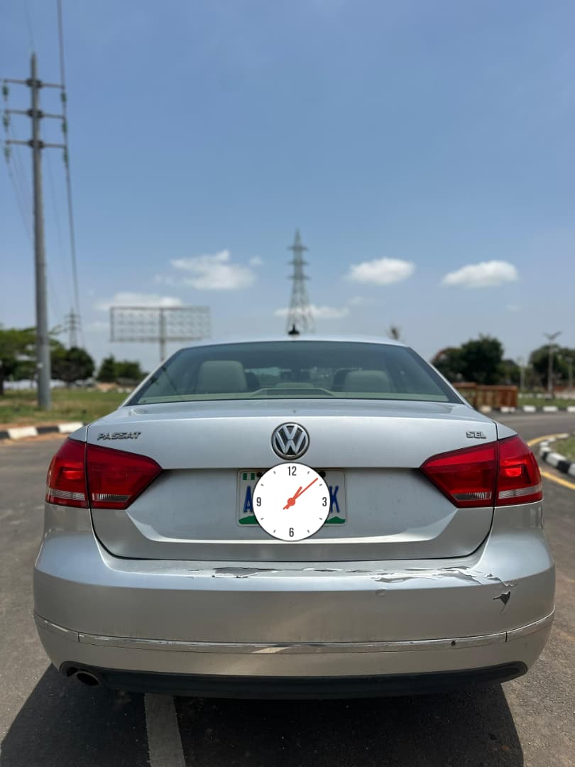 
								Good Deal‼️‼️‼️ Grade A (Carefully Used) 2013 Volkswagen Passat (Se) car is in pristine condition(Nothing To Fix) Sunroof with original duty going for just 7m Net with me Lugbe Abuja📍 ZERO CHAIN DEAL full									