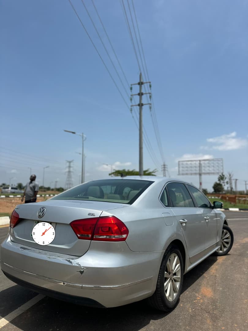 
								Good Deal‼️‼️‼️ Grade A (Carefully Used) 2013 Volkswagen Passat (Se) car is in pristine condition(Nothing To Fix) Sunroof with original duty going for just 7m Net with me Lugbe Abuja📍 ZERO CHAIN DEAL full									