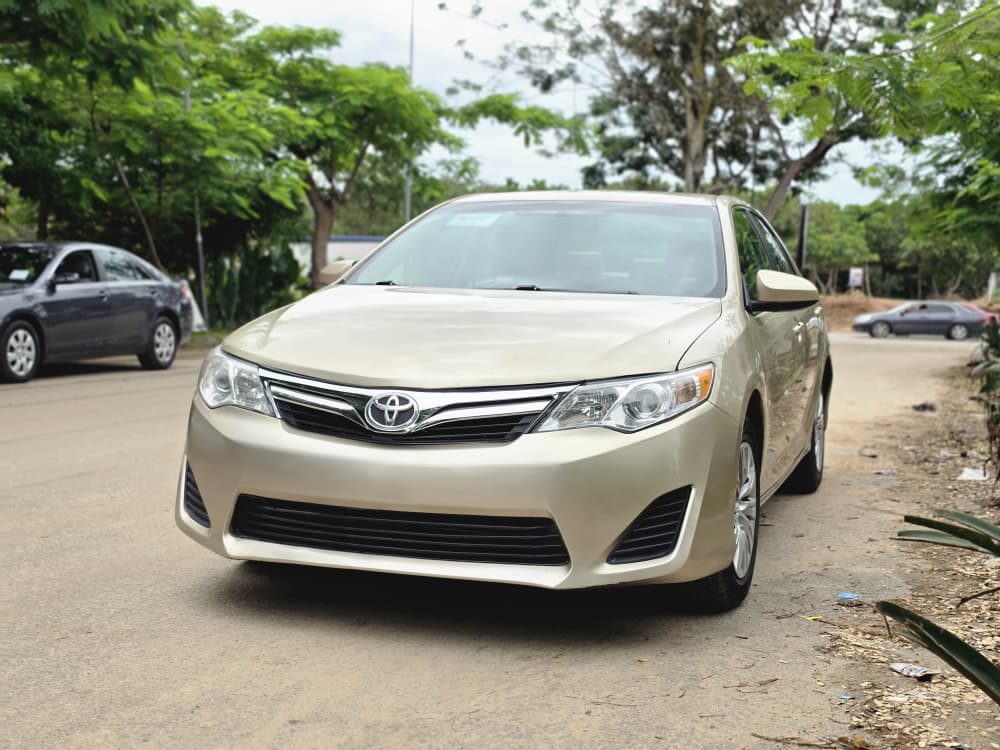 
								Lastest Arrival: Extremely clean foreign used 2013 Toyota Camry LE first body pan with recent 2026 Duty, going for just 12.8m 200k Sambo. Abujadeal full									