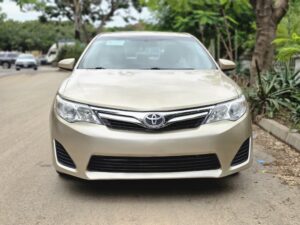 Lastest Arrival: Extremely clean foreign used 2013 Toyota Camry LE first body pan with recent 2026 Duty, going for just 12.8m 200k Sambo. Abujadeal