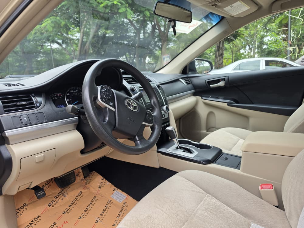 
								Lastest Arrival: Extremely clean foreign used 2013 Toyota Camry LE first body pan with recent 2026 Duty, going for just 12.8m 200k Sambo. Abujadeal full									
