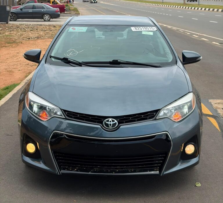 FOREIGN USED 2015 TOYOTA COROLLA NOTHING TO FIX WITH ORIGINAL CUSTOM DUTY GOING FOR 15M ABUJA DEAL