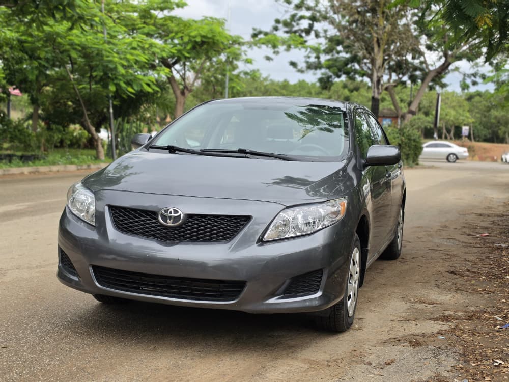 
								New in: Extremely clean foreign used Toyota corolla 2010 on belt. Accident Free, June 2026 Duty going for just 9.8m with no single 9ja paint full									