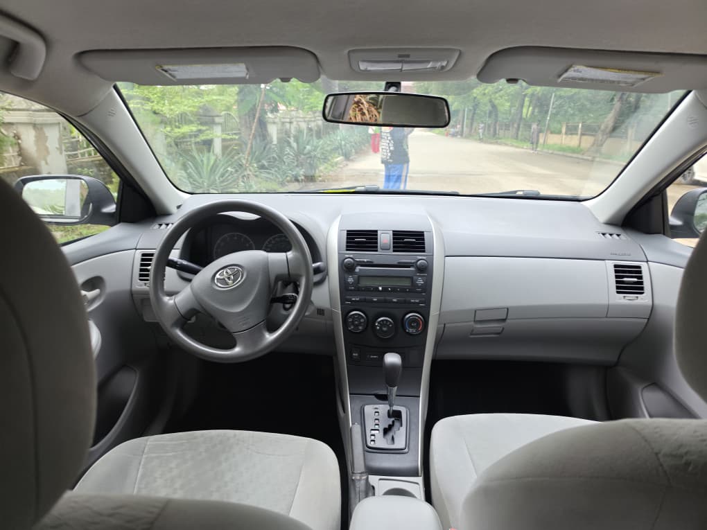 
								New in: Extremely clean foreign used Toyota corolla 2010 on belt. Accident Free, June 2026 Duty going for just 9.8m with no single 9ja paint full									