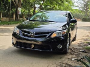 New in: Extremely clean foreign used Toyota corolla LE 2012 on belt. Accident Free, with sunroof  going for just 12m with no single 9ja paint