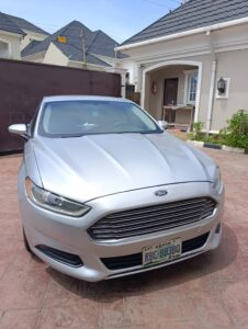 First body 2014 Ford fusion Edmund  Edition Untampered Engine and Gear. The interior is superb with ice chilling AC. Car comes with New Tyres and Original Custom papers 6.8m