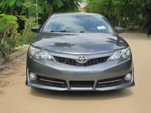 QUICKEST SWEET DEAL:  EXTREMELY SHARP HIGEHST GRADE FOREIGN USED 2014 ON BELT TOYOTA CAMRY SE, MINT INTERIOR, NO SINGLE 9JA PAINT WITH UNTAMPARED ENGINE ND GEAR.GOING FOR JUST 13.8M.