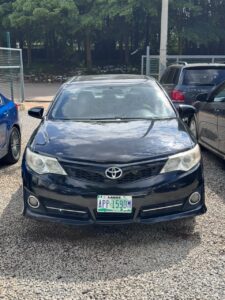 Sharp Toyota Camry 2014. XLE with open roof and back Ac vent is available for  9.8million Abuja
