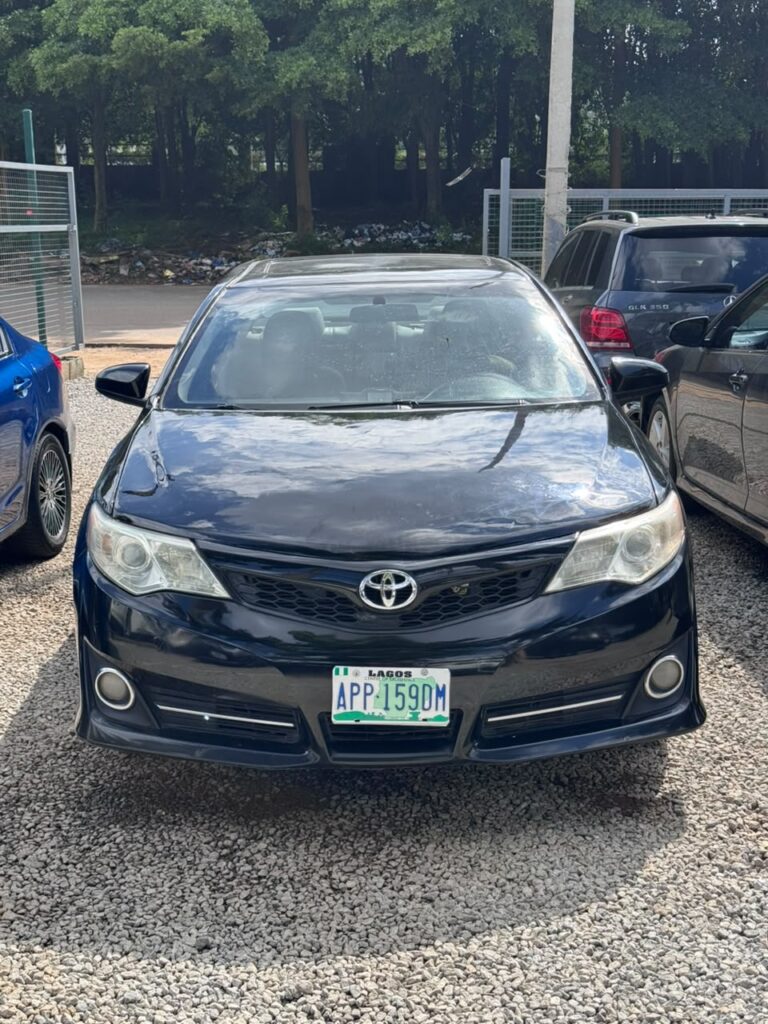 Sharp Toyota Camry 2014. XLE with open roof and back Ac vent is available for  9.8million Abuja