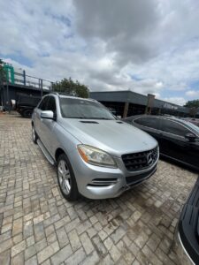First body 2014 ML 350   With Untampered engine and gear  Ac chilling  Only issue is new car battery  Black interior  Going for 15m  Abuja