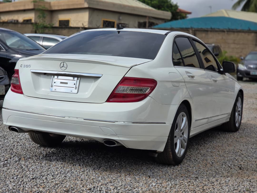
								Belgium standard C300 2010 upgraded to 2013 model with untampered engine and gear Ac chilling well Buy and drive absolutely nothing to fix Accident free  👉6.2m buyer settle 200k location Abacha Road nyanya Abuja deal Car is with me directly full									