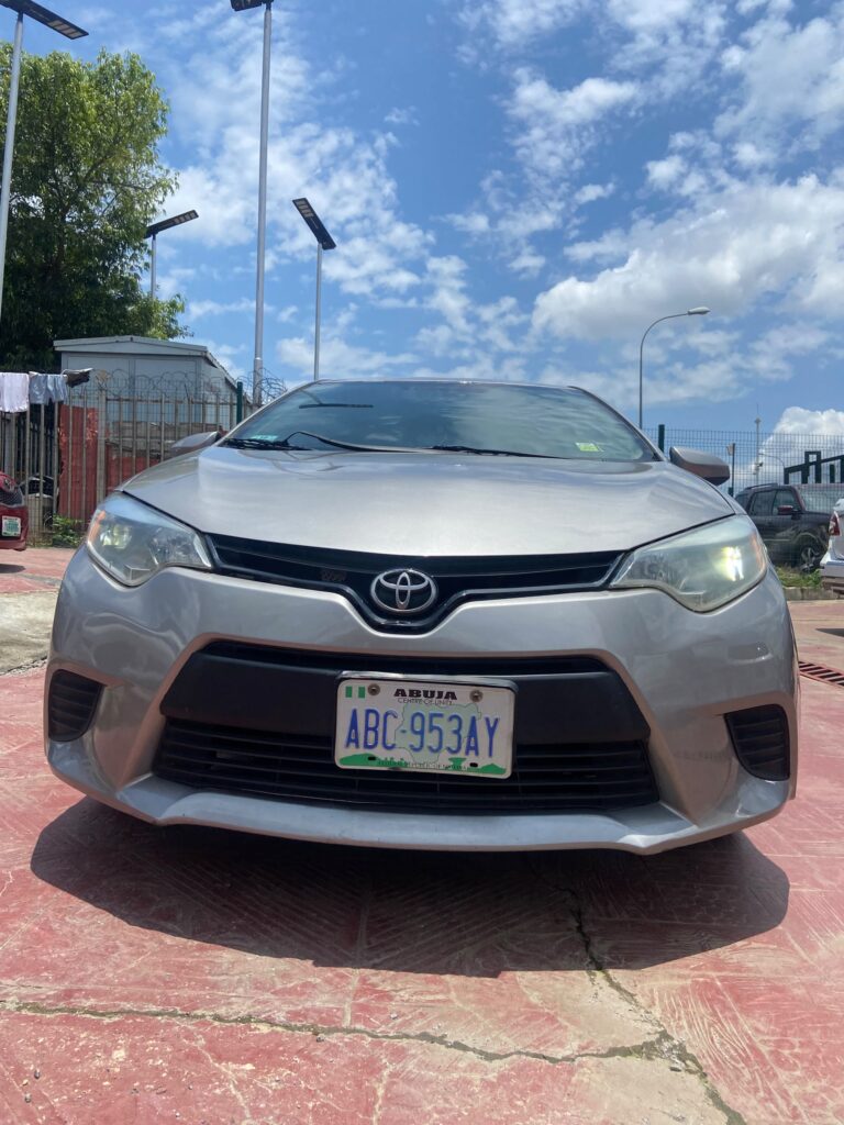 Distress alert Neatly used 2014 Toyota Corolla with original custom duty, sound engine and gear AC functioning very well, just 9 million, owner needs money urgent, hurry up before you sold, location Abuja