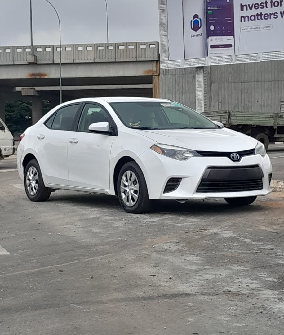 
								FOREIGN USED 2015 TOYOTA COROLLA LE WITH FOLLOW COME SCREEN, REVERSE CAMERA,ORIGINAL CUSTOM DUTY GOING FOR 14.7M ABUJA DEAL full									