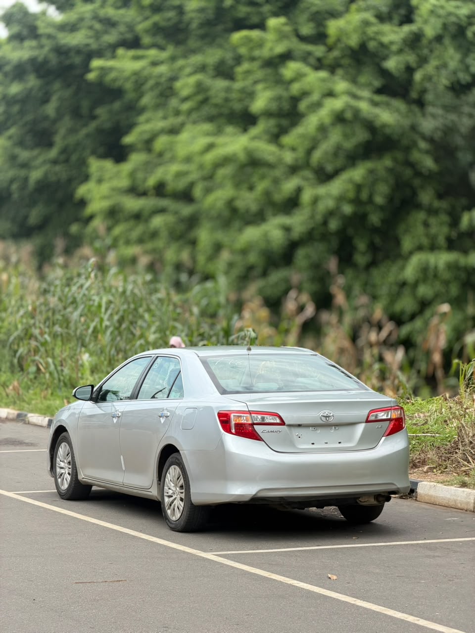 
								EXTREMELY CLEAN FOREIGN USED 2014 TOYOTA CAMRY LE WITH DUTY 💰 12.8M BUYER SETTLE 200K 👌 ABUJA DEAL full									