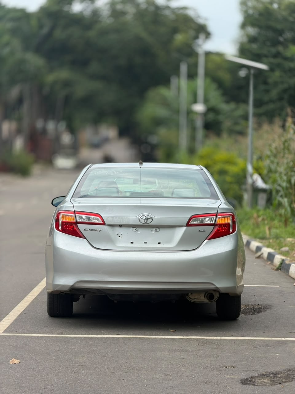 
								EXTREMELY CLEAN FOREIGN USED 2014 TOYOTA CAMRY LE WITH DUTY 💰 12.8M BUYER SETTLE 200K 👌 ABUJA DEAL full									