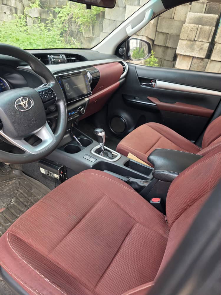 
								Distress Alert few months use Belgium standard Extremely sharp  Toyota Hilux 2018 model with untampered engine and gear Ac chilling well Original 2025 custom duty Automatic transmission  👉37m to owner  Buyer settle 1m Location ABUJA  Owner house full									