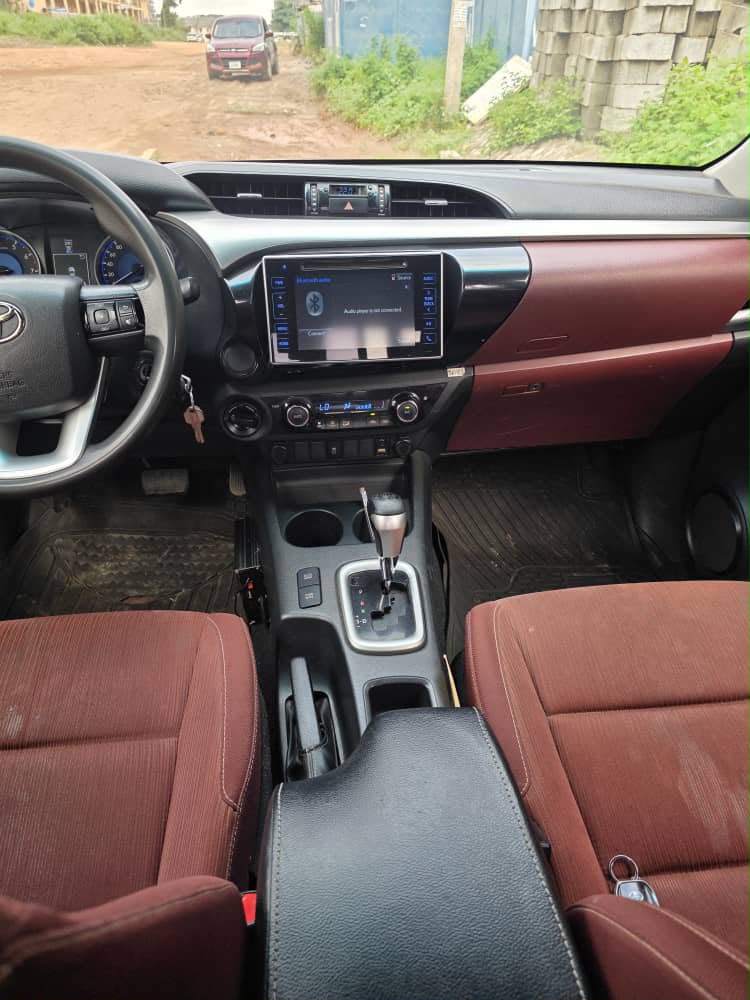 
								Distress Alert few months use Belgium standard Extremely sharp  Toyota Hilux 2018 model with untampered engine and gear Ac chilling well Original 2025 custom duty Automatic transmission  👉37m to owner  Buyer settle 1m Location ABUJA  Owner house full									