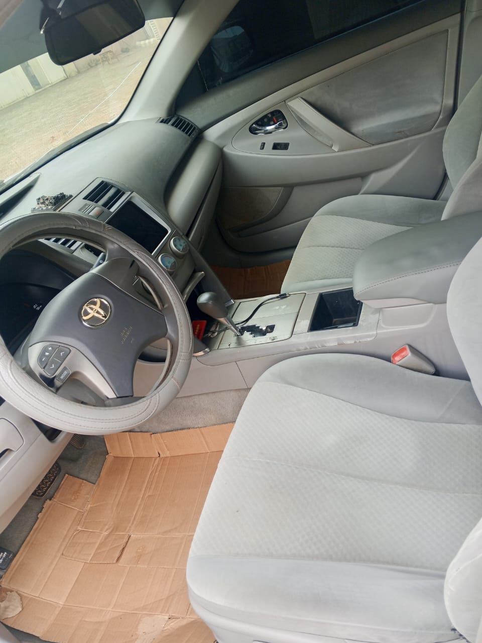 
								Tok standard, Toyota Camry 08 model unregistered 2025 entry engine and gear untempered AC factory fits buy and drive nothing to fix price 5.3m location Abacha Road nyanya Abuja settlement 100k full									